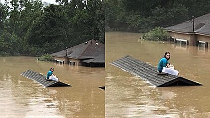 Jovem nada até telhado de casa com o seu cão para se salvarem de inundações.