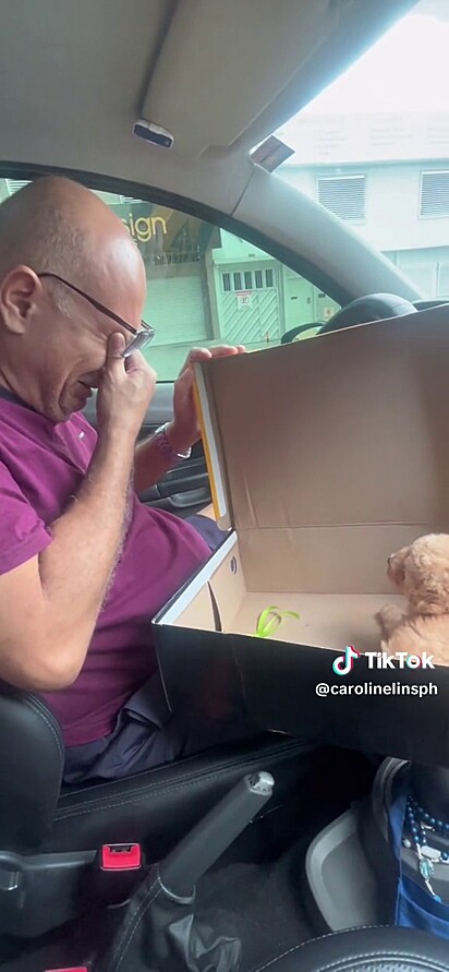 Homem chora de emoção ao ser presenteado com filhote de cachorro no Dia dos Pais.
