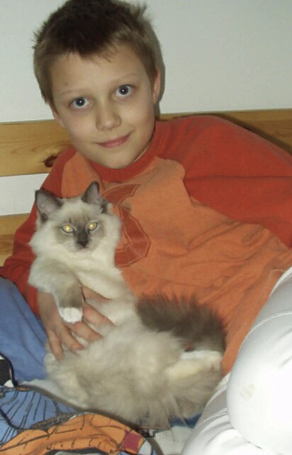 Roman e o gato Gandalf, em 2003.