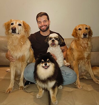 Luan Aguiar e seus quatro cães.