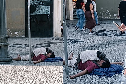 Cão chama atenção por proteger tutor enquanto dorme