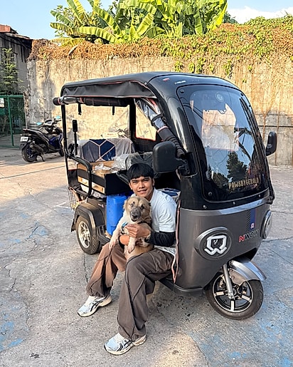Gerald com o seu cachorrinho Ace.