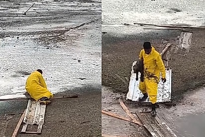 Após escutarem que era impossível, trabalhadores de obra se reúnem e conseguem salvar cão atolado em piscinão